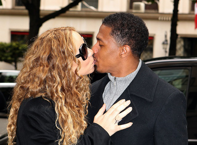 Mariah Carey and Nick Cannon share a kiss in Paris [USA ONLY]