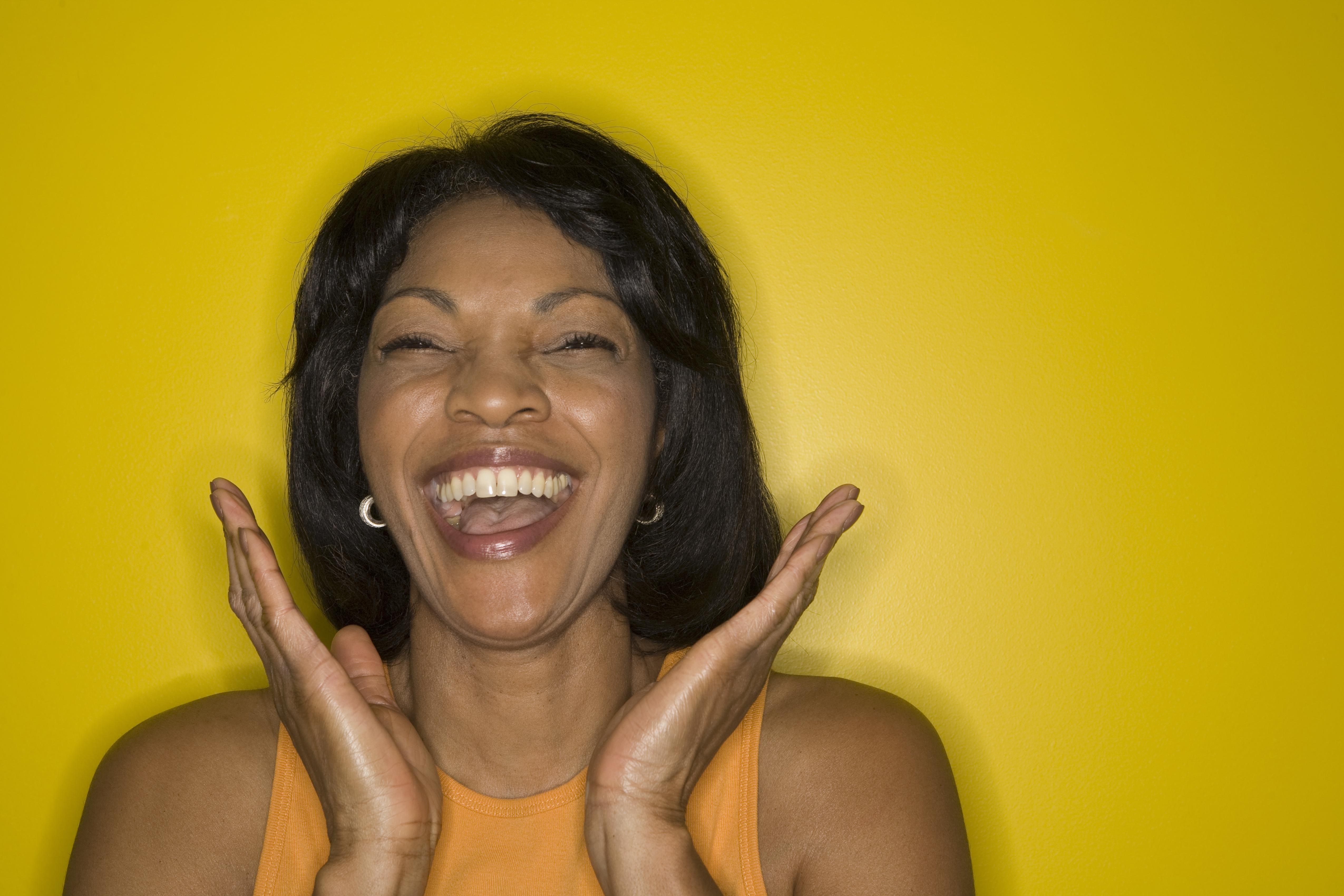 Mature woman laughing, close-up