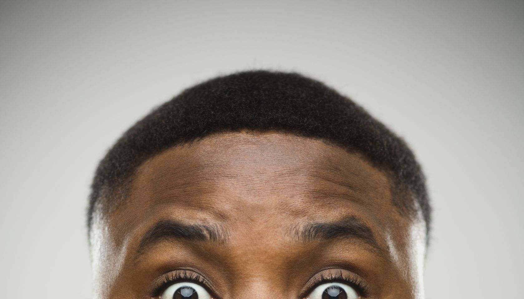 Close-up portrait of shocked man