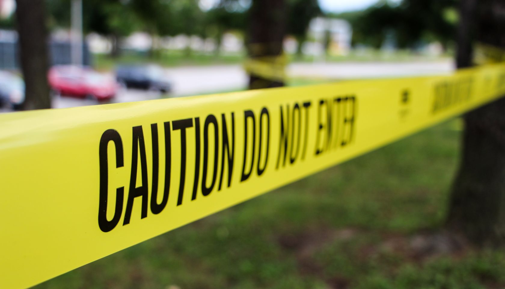 Close-Up Of Cordon Tape At Park