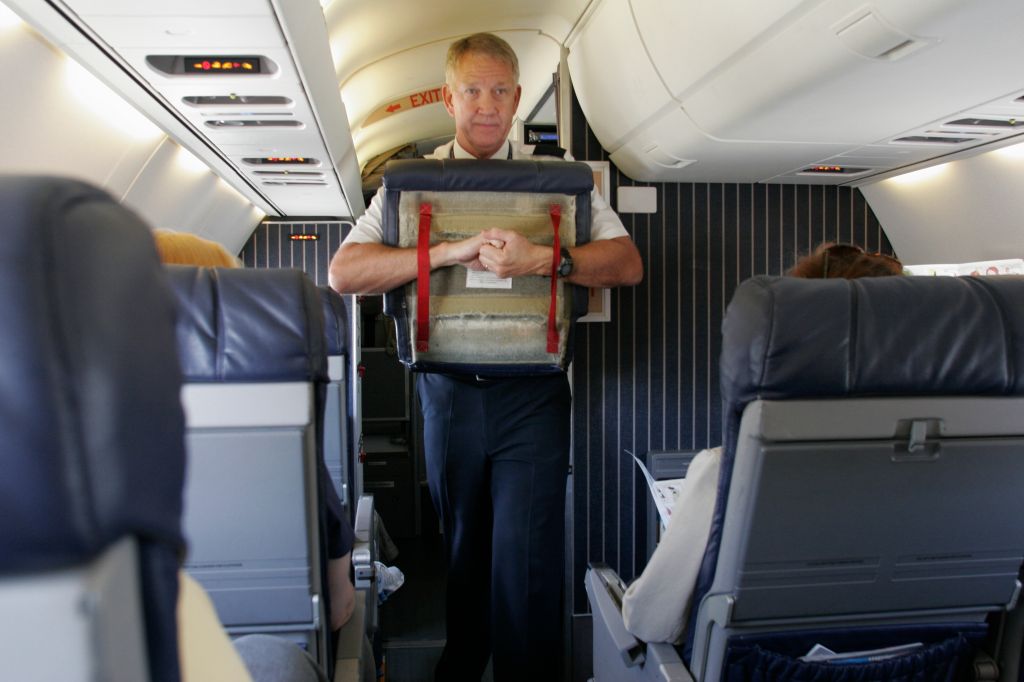 Orlando Airport, Delta commuter jet, flight attendant