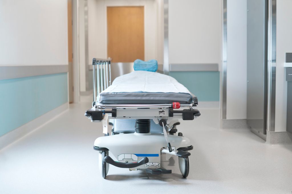 Hospital bed in corridor