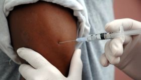 A man receiving a vaccine shot