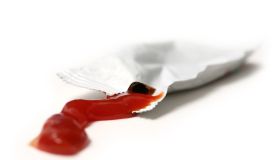 Ketchup on white background