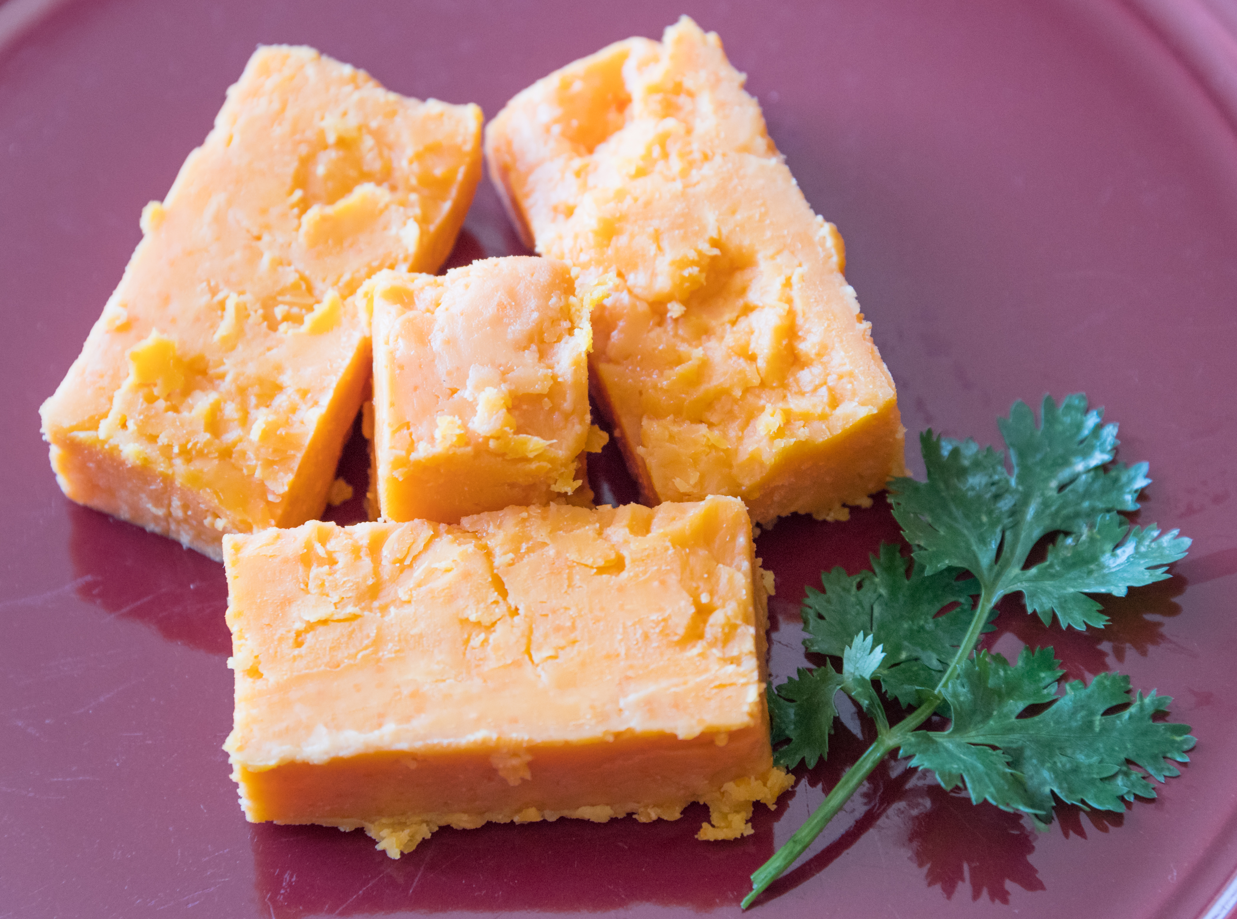 English red leicester hard ripened cheese. Four blocks of...
