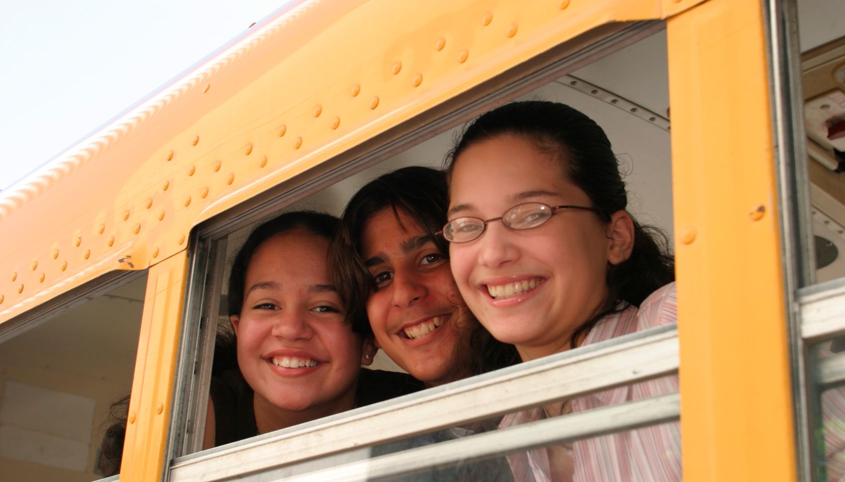 Middle school students on a school bus at the Drug Free Youth In Town, Awards Luncheon at Hyatt Regency Hotel.