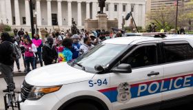 Columbus Police cruisers round the Ohio Statehouse interact...