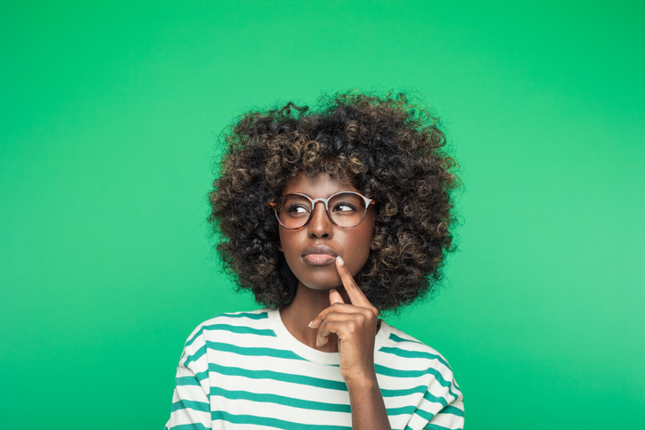 Spring portrait of thoughtful young woman