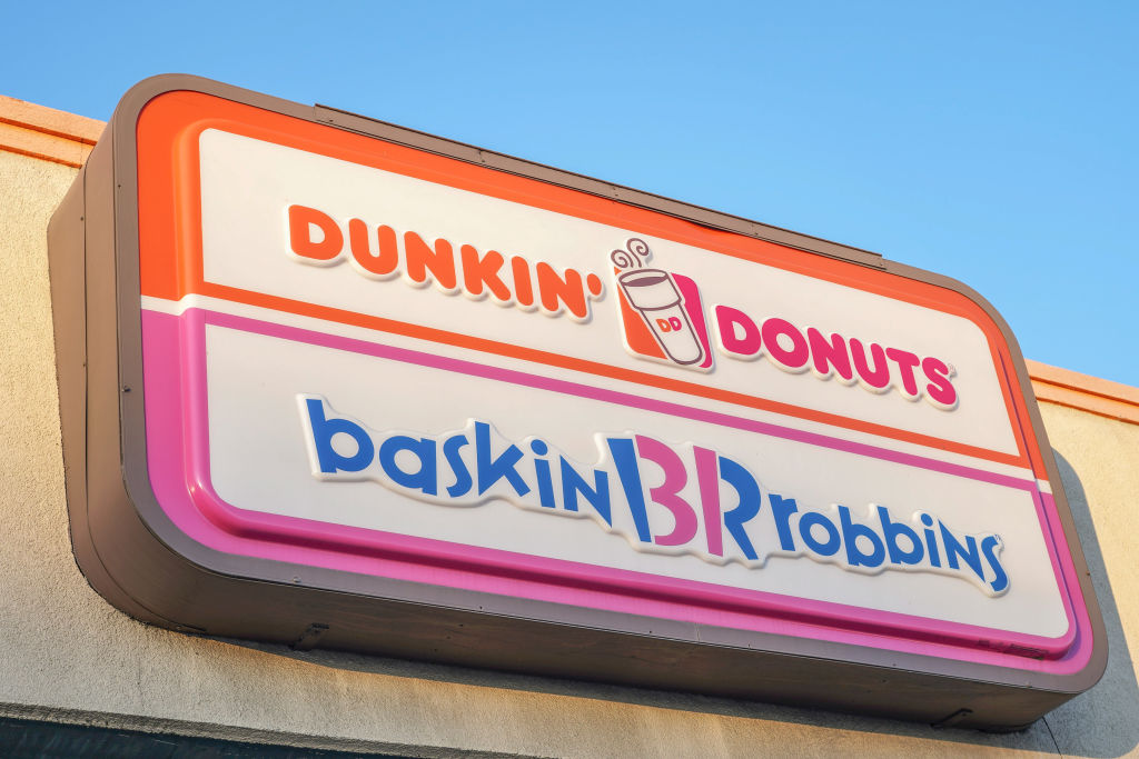 A view of Dunkin' Donuts and Baskin-Robbins store logo. The...