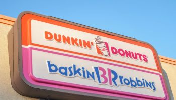 A view of Dunkin' Donuts and Baskin-Robbins store logo. The...