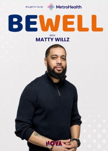 A man with a beard wearing a black sweater, standing in front of a "Be Well with Matty Willz" logo.